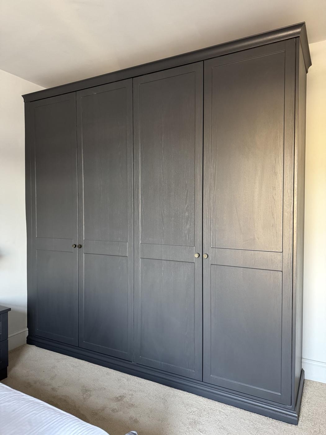 Charcoal shaker fitted wardrobes with cornice and brass knobs